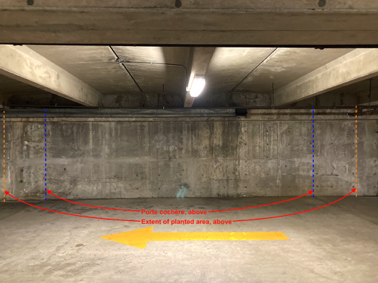 Lower parking level--it is easy to see how the porte-cochère relates from the discoloration of the foundation wall